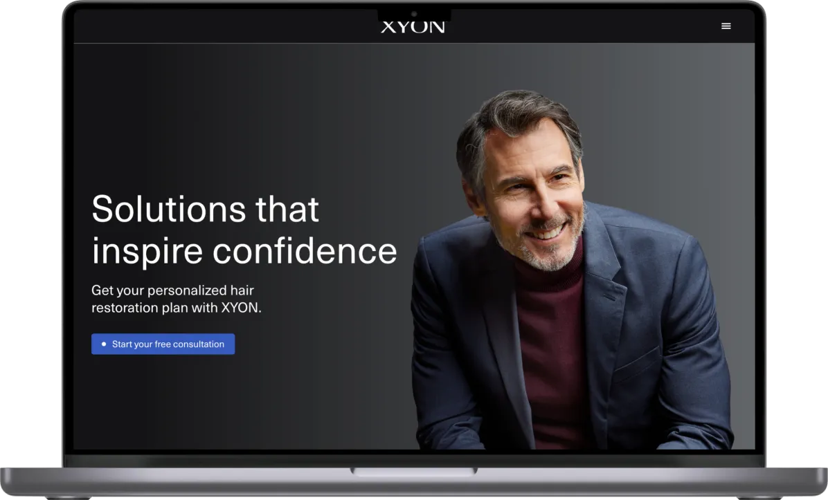 The XYON Health marketing homepage on a laptop